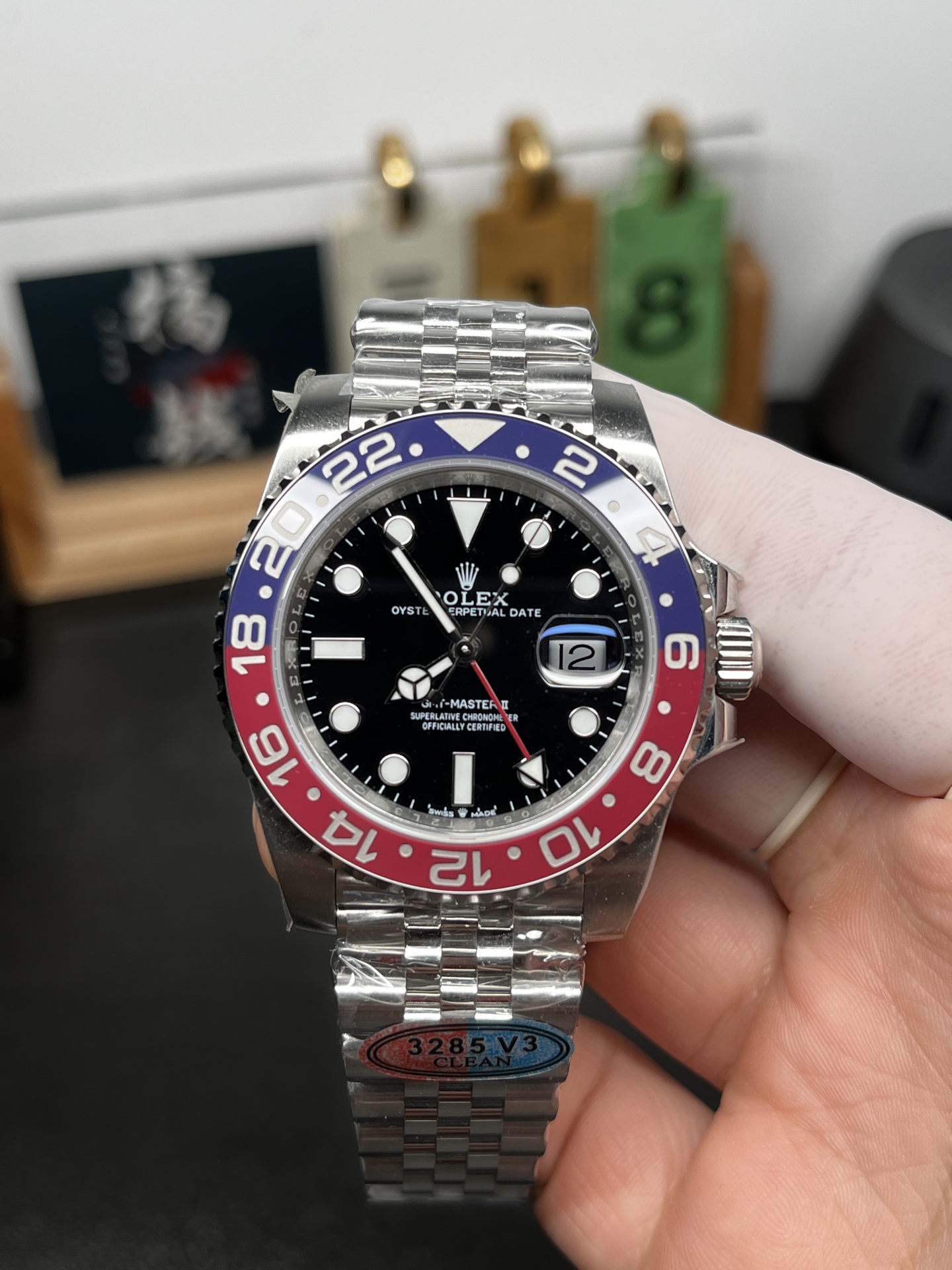 Clean Factory GMT Master II Pepsi 3285 V3 replica watch front view with black dial and jubilee bracelet