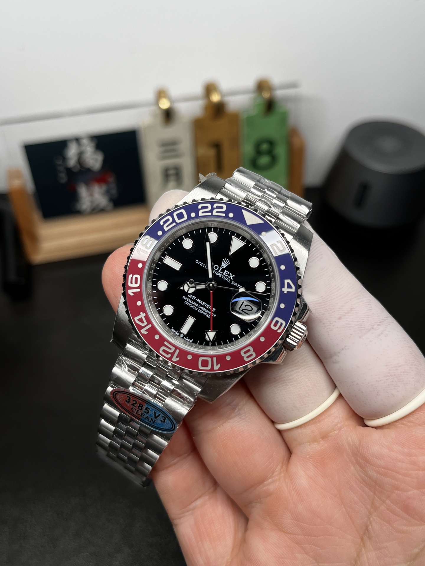 Replica GMT Master II Pepsi watch angled view showing bezel colors and jubilee bracelet finishing
