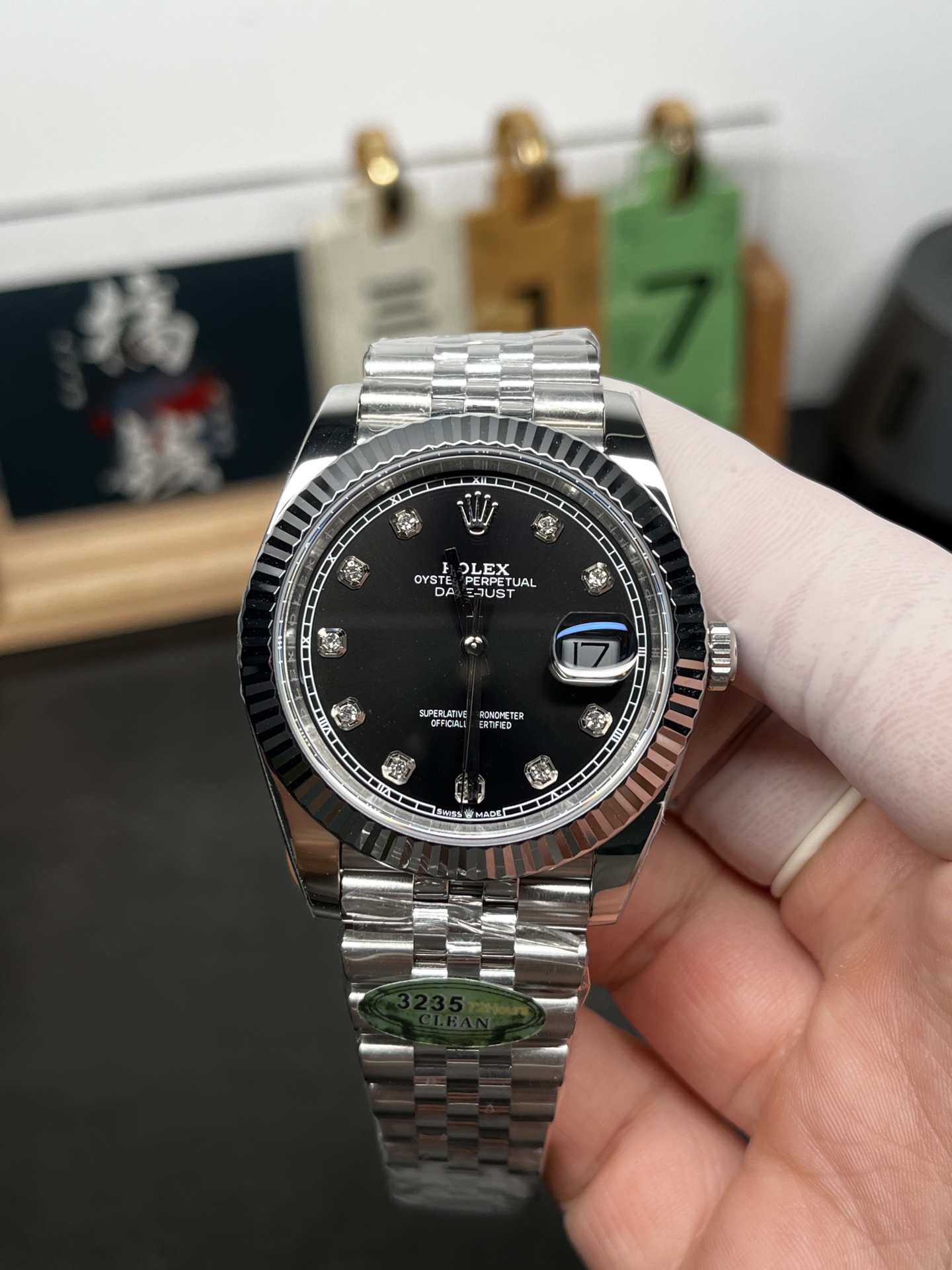 Super Clone Rolex Datejust front view with black dial and fluted bezel
